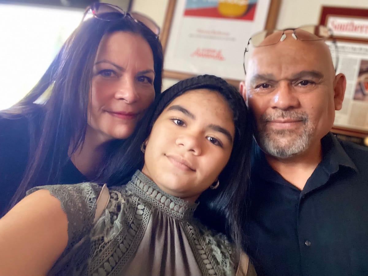 Santos and Lizy Reyes, the husband-and-wife team behind Curb-It Solutions